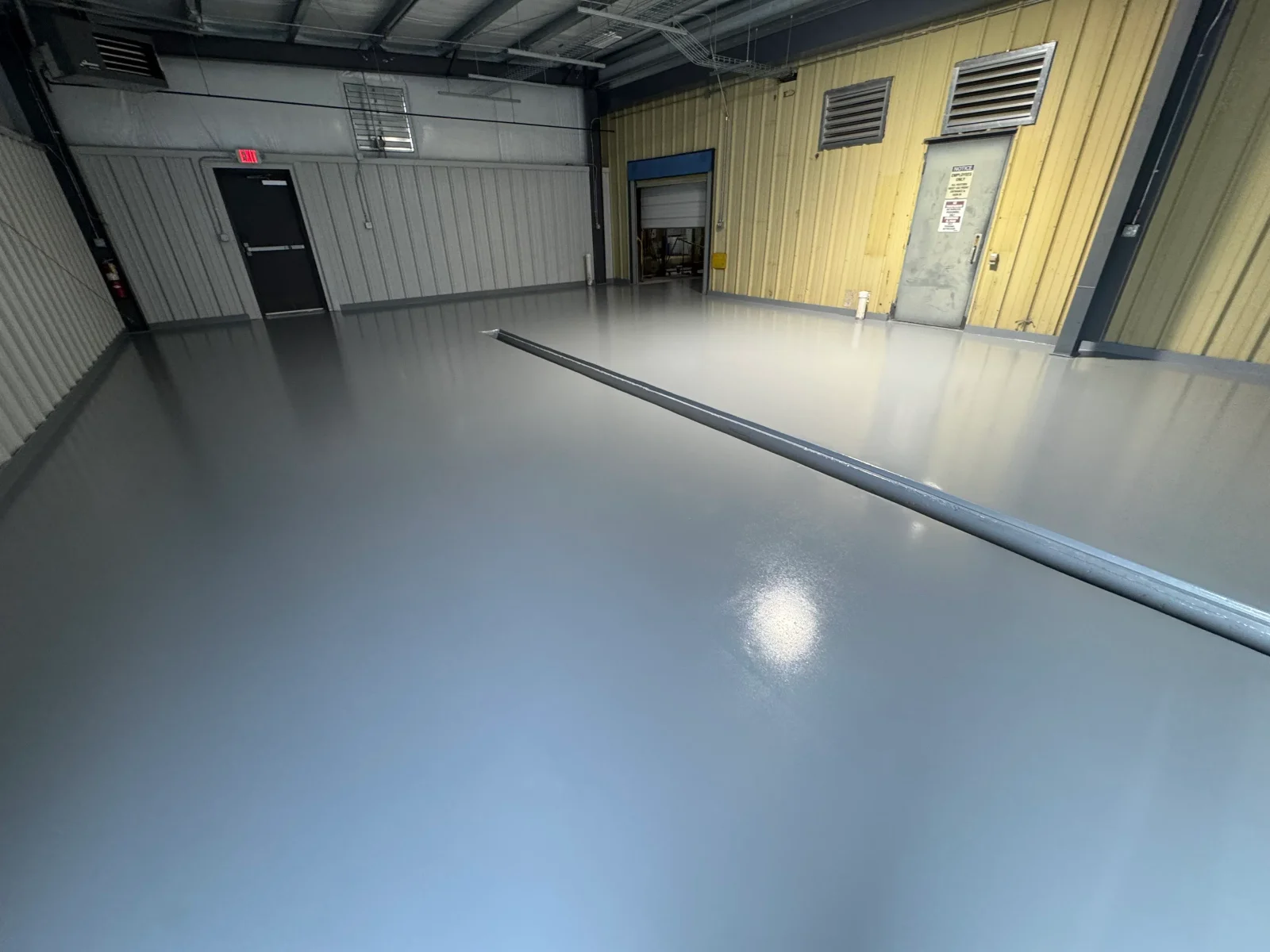 Polished concrete floor with a smooth, reflective finish