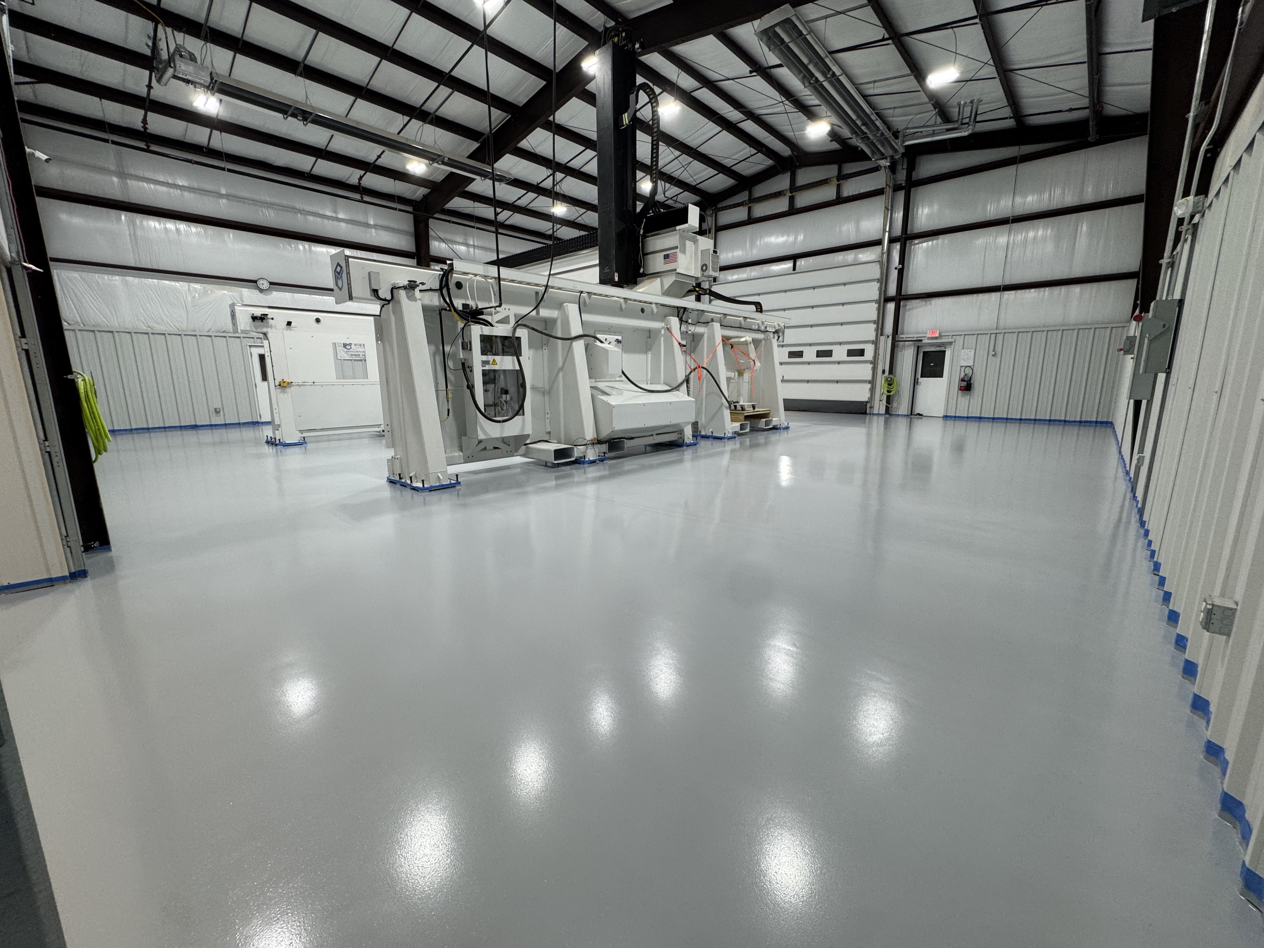 Industrial gray epoxy floor coating in a clean commercial building